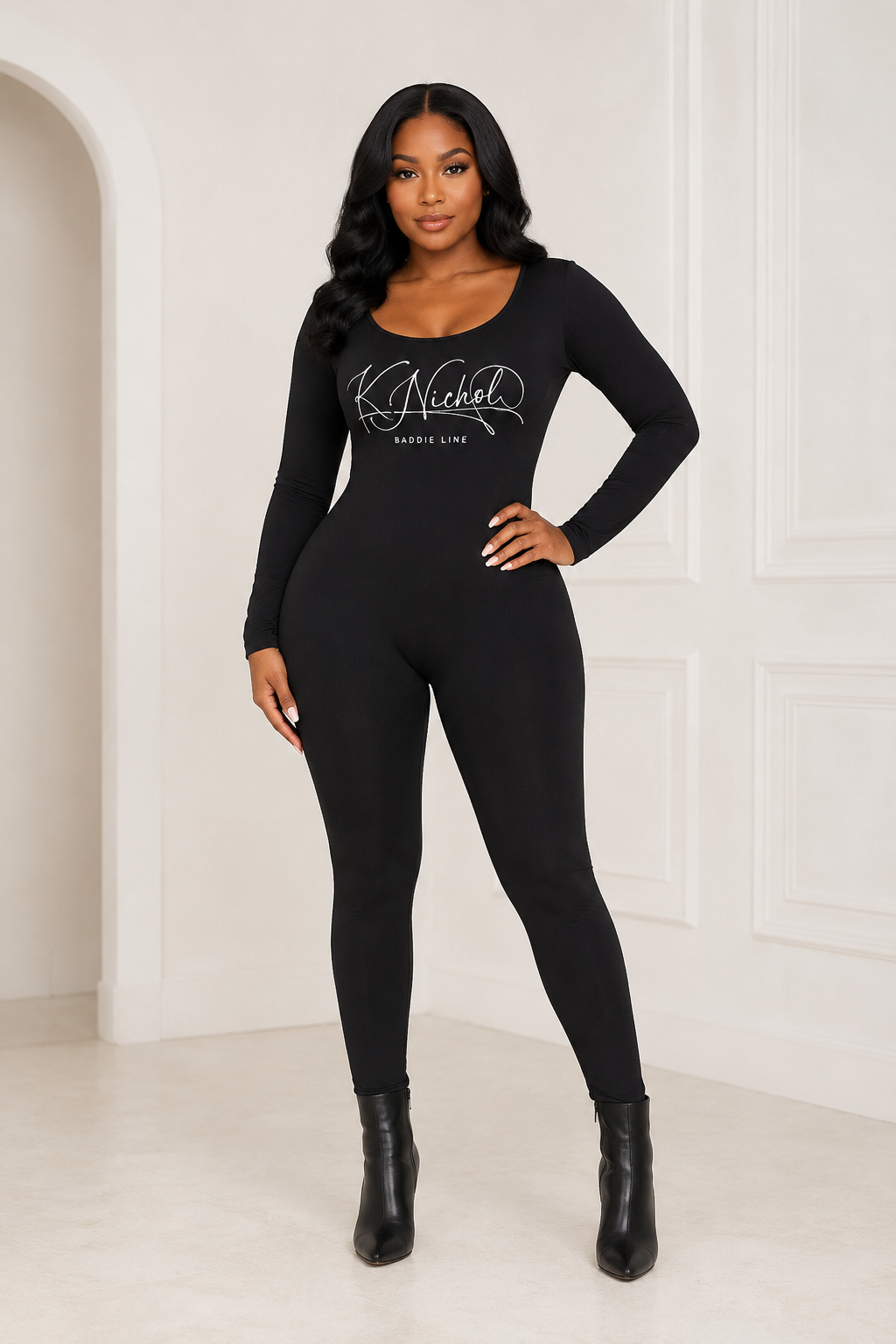 Model wearing the black K Nichol Baddie Line catsuit